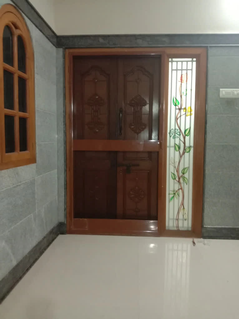 Frame matched to a carved teak door